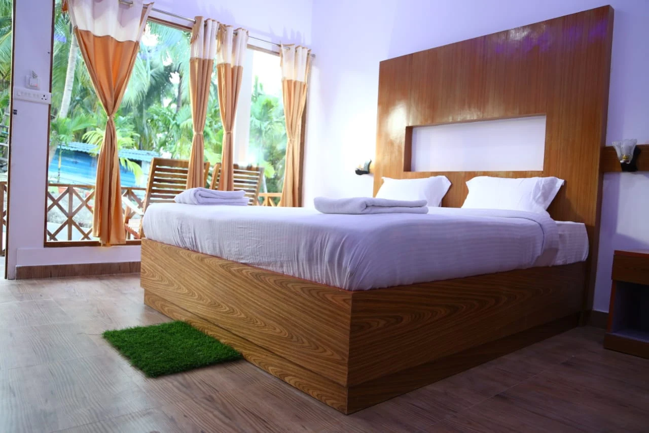 Laxmi Continental Resort rooms.webp